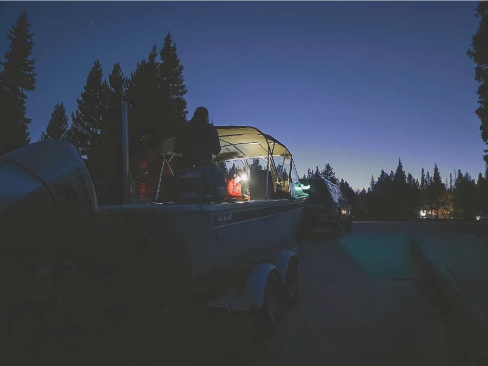 Biologists prepare to launch a boat at Rob Roy Reservoir after nautical twilight